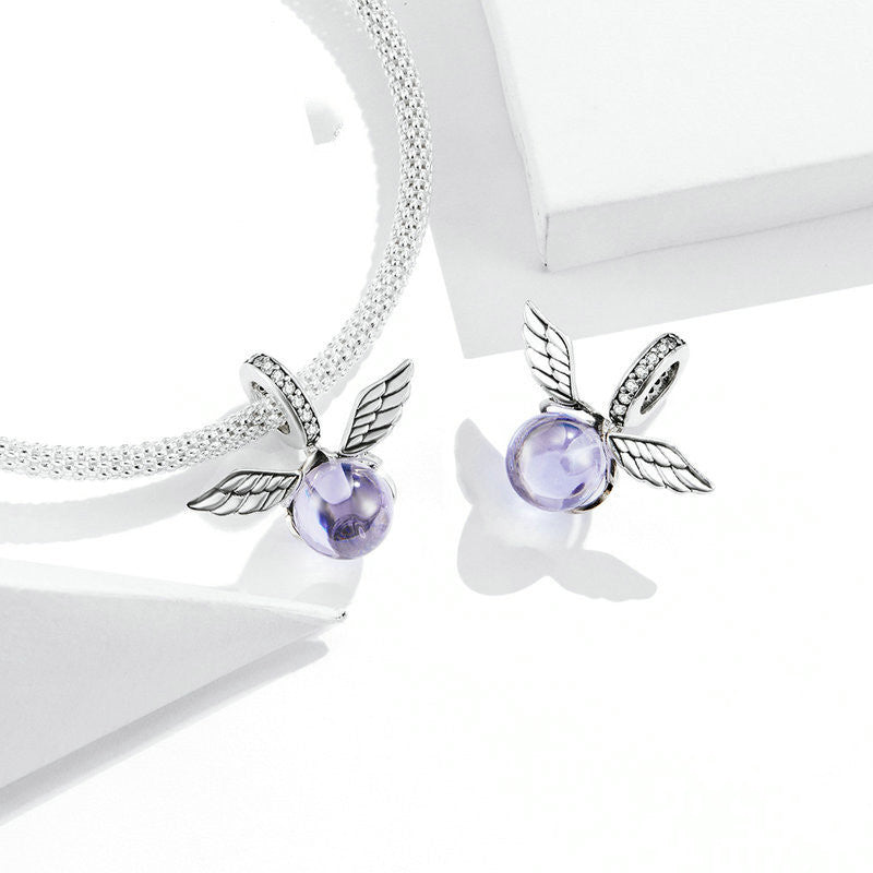 Pendant with Wings Inlaid With Glass Beads and Beaded Jewelry