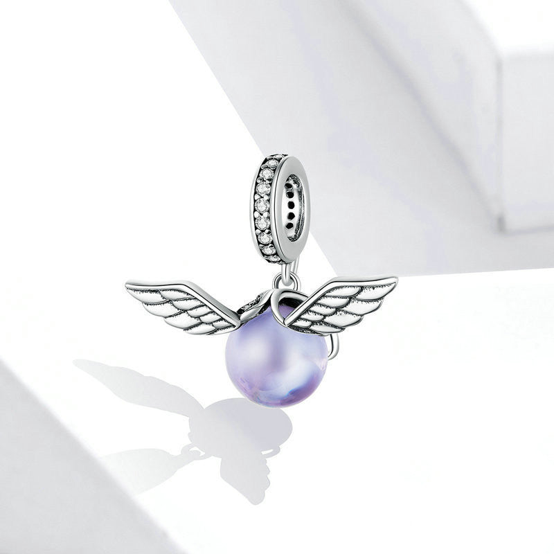 Pendant with Wings Inlaid With Glass Beads and Beaded Jewelry
